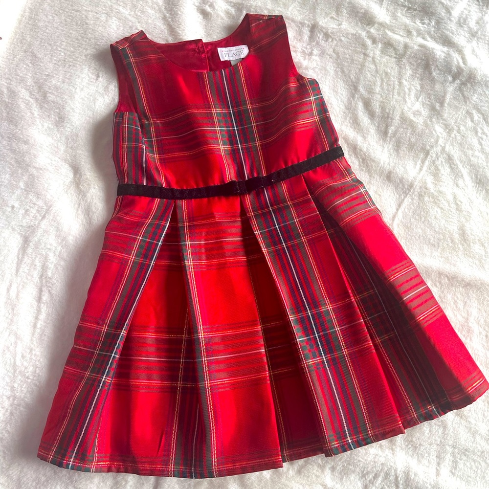 Holiday Dress. Christmas dress shop. Red plaid. Black trim